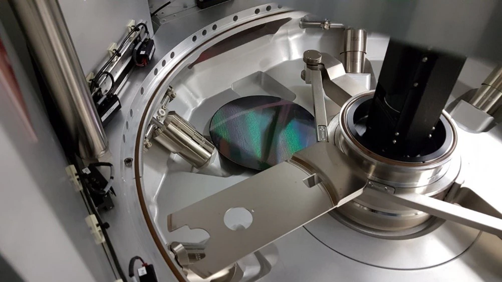 Silicon wafer loaded inside a semiconductor process tool chamber