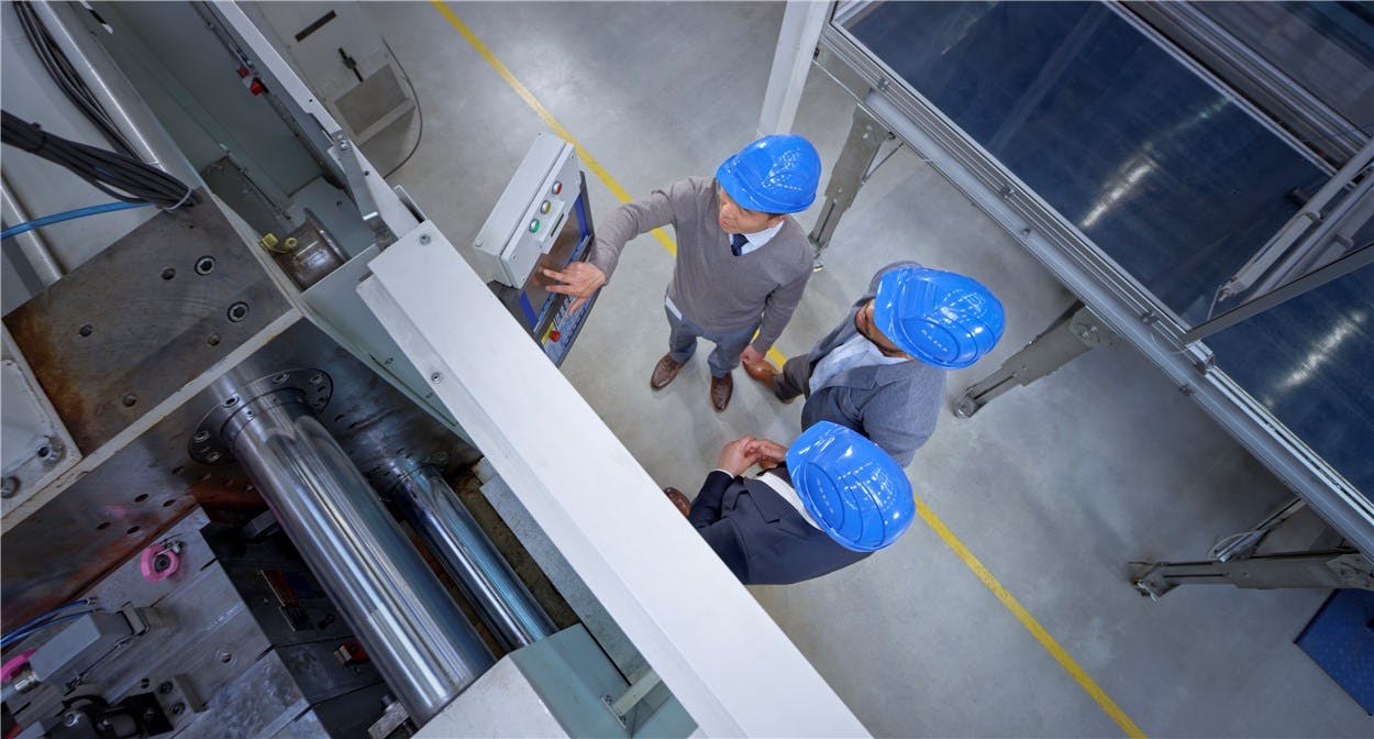 Victrex employees wearing blue hard hats