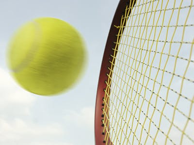 Tennis racket and ball