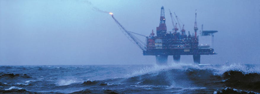 Oil rig in rough waters 